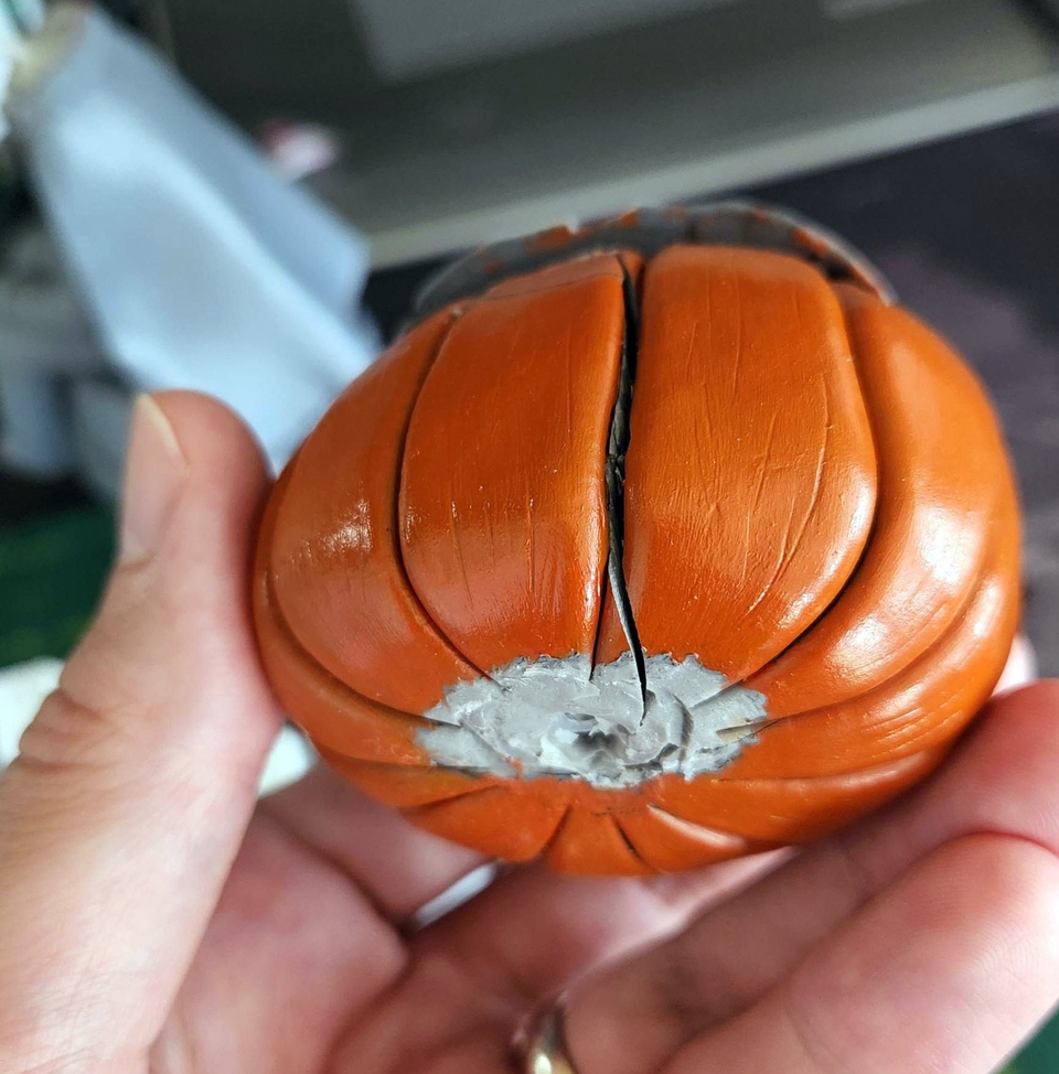 Mr. Pumpkin's head splits open
